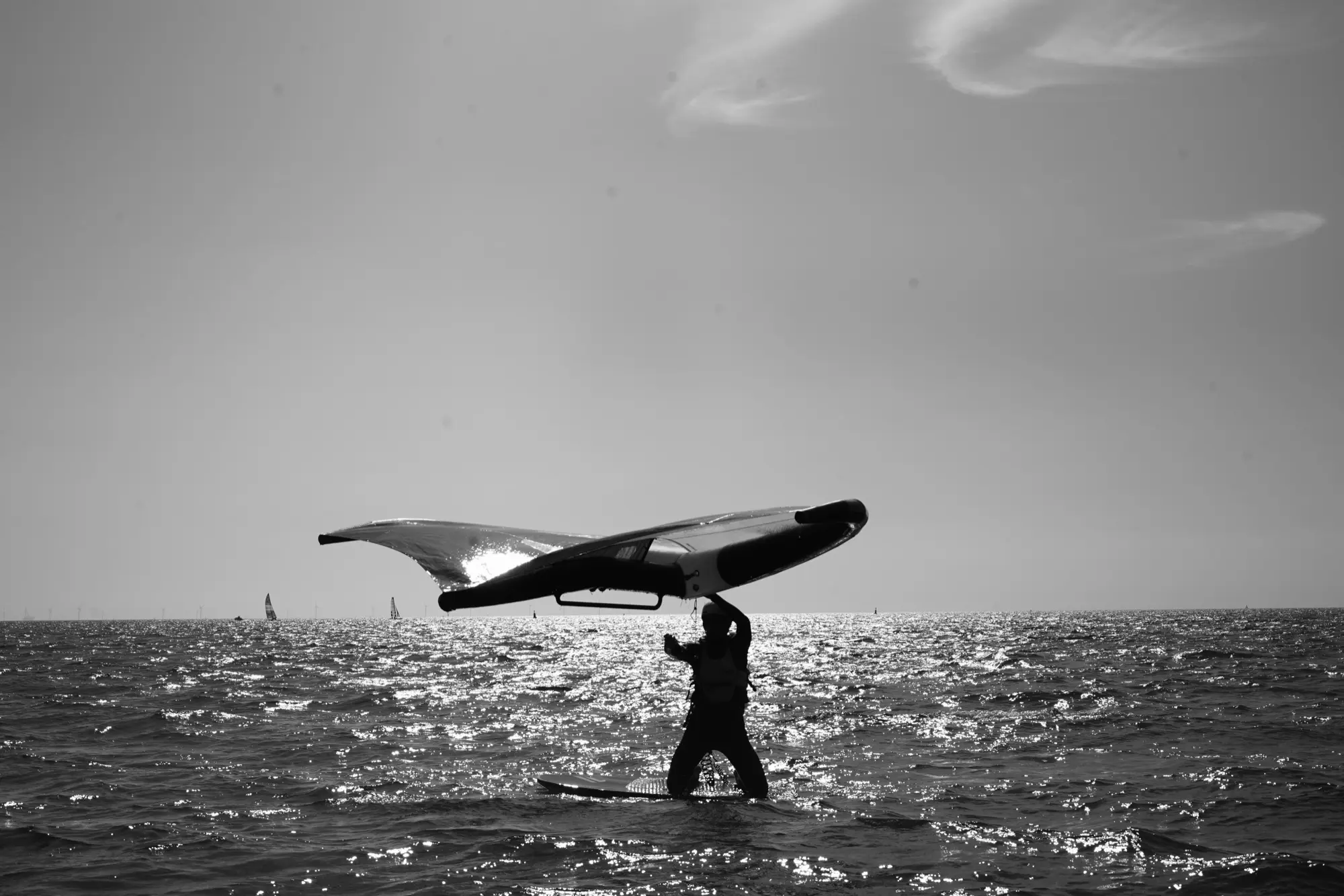 Estéban flying to new horizon on a wingfoil.