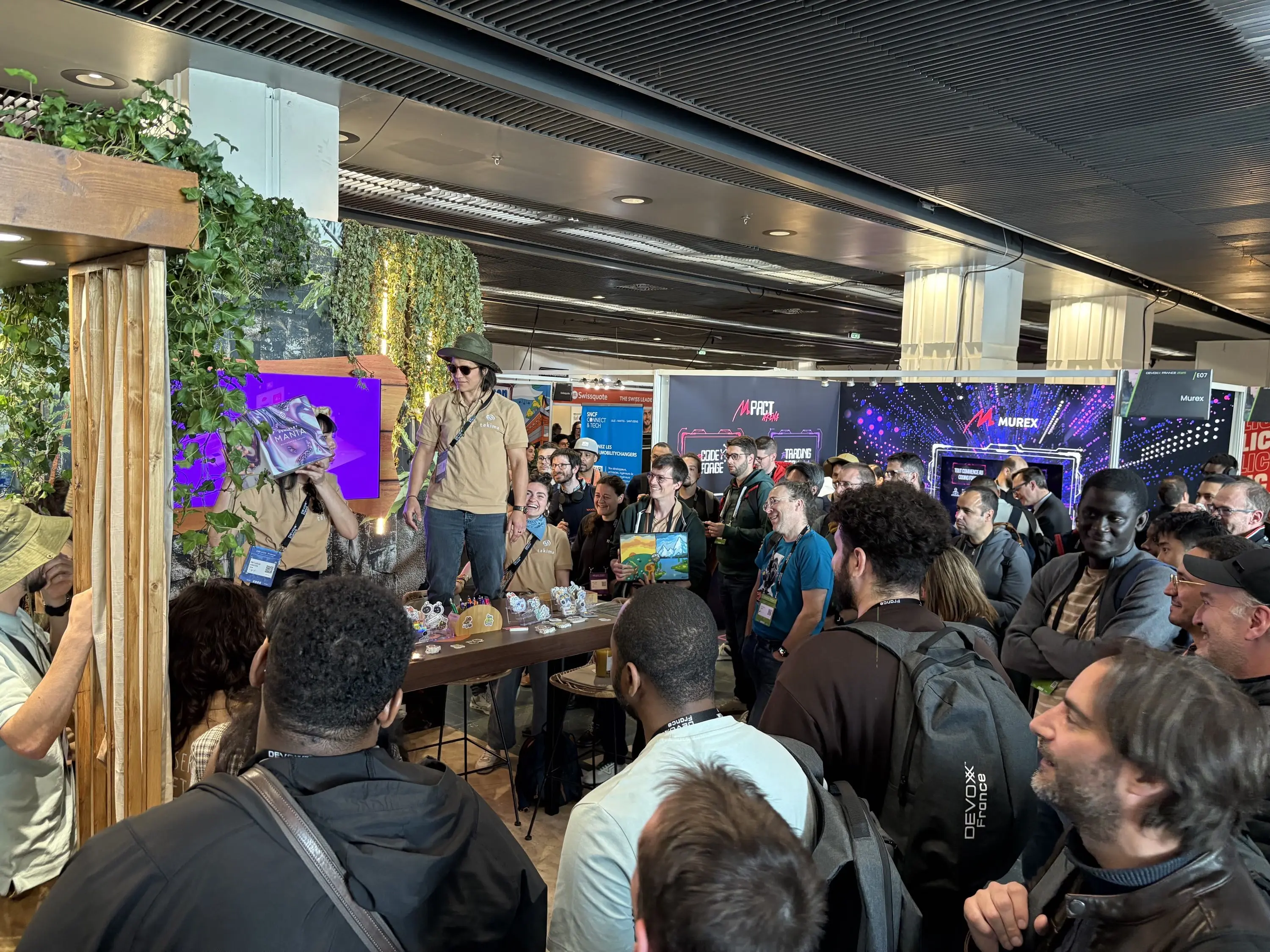 Takima stand during the game draw to win headphones, speakers, and trainings.