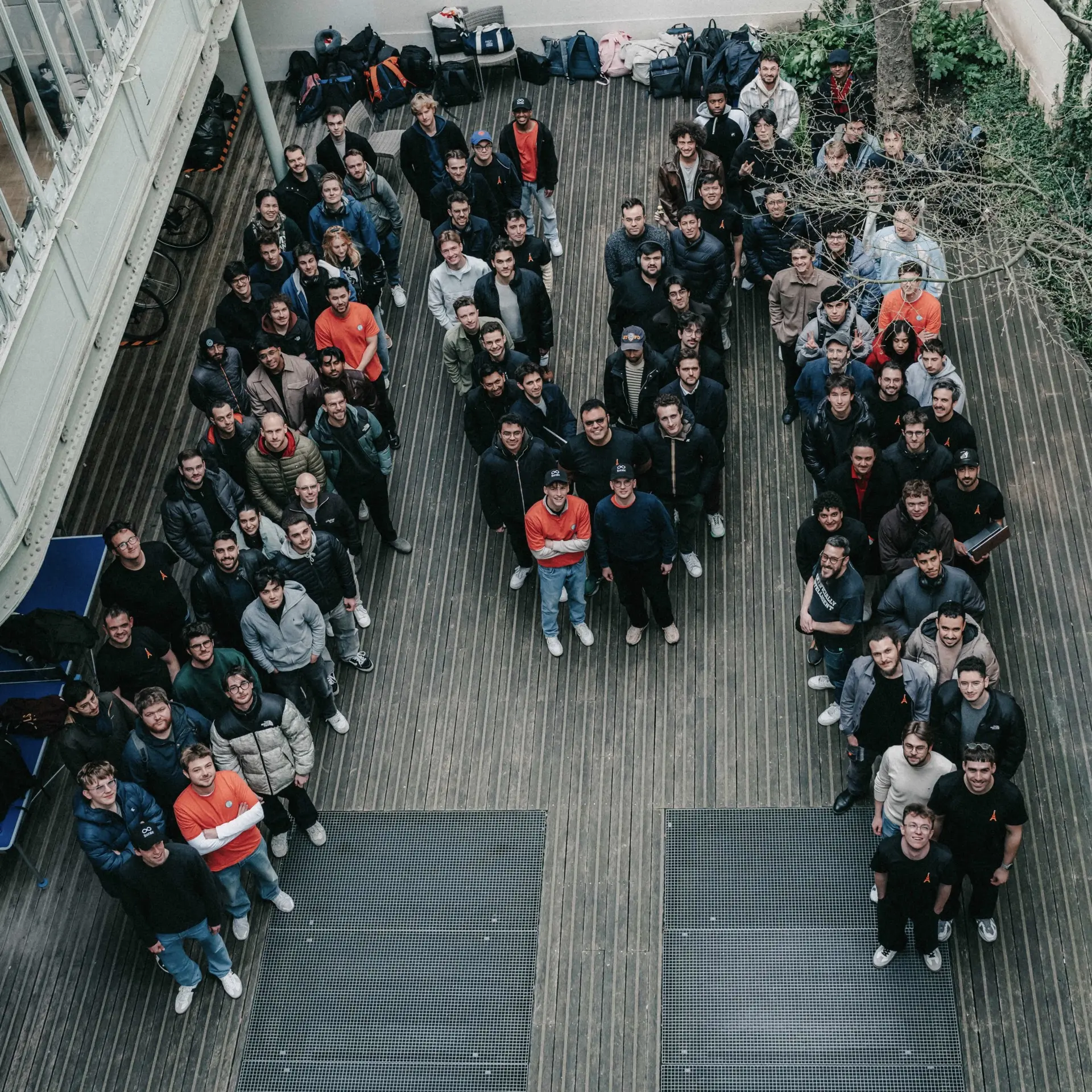 All the participants, jury, and organizers of the hackathon forming a M.