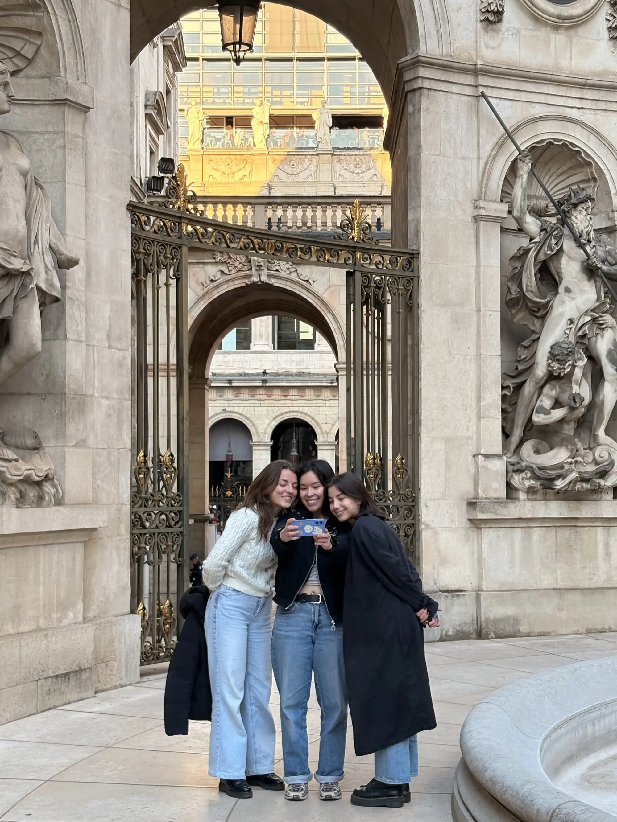 Photo of Marion, Elise, and Victoire in the Lyon City Hall during the party