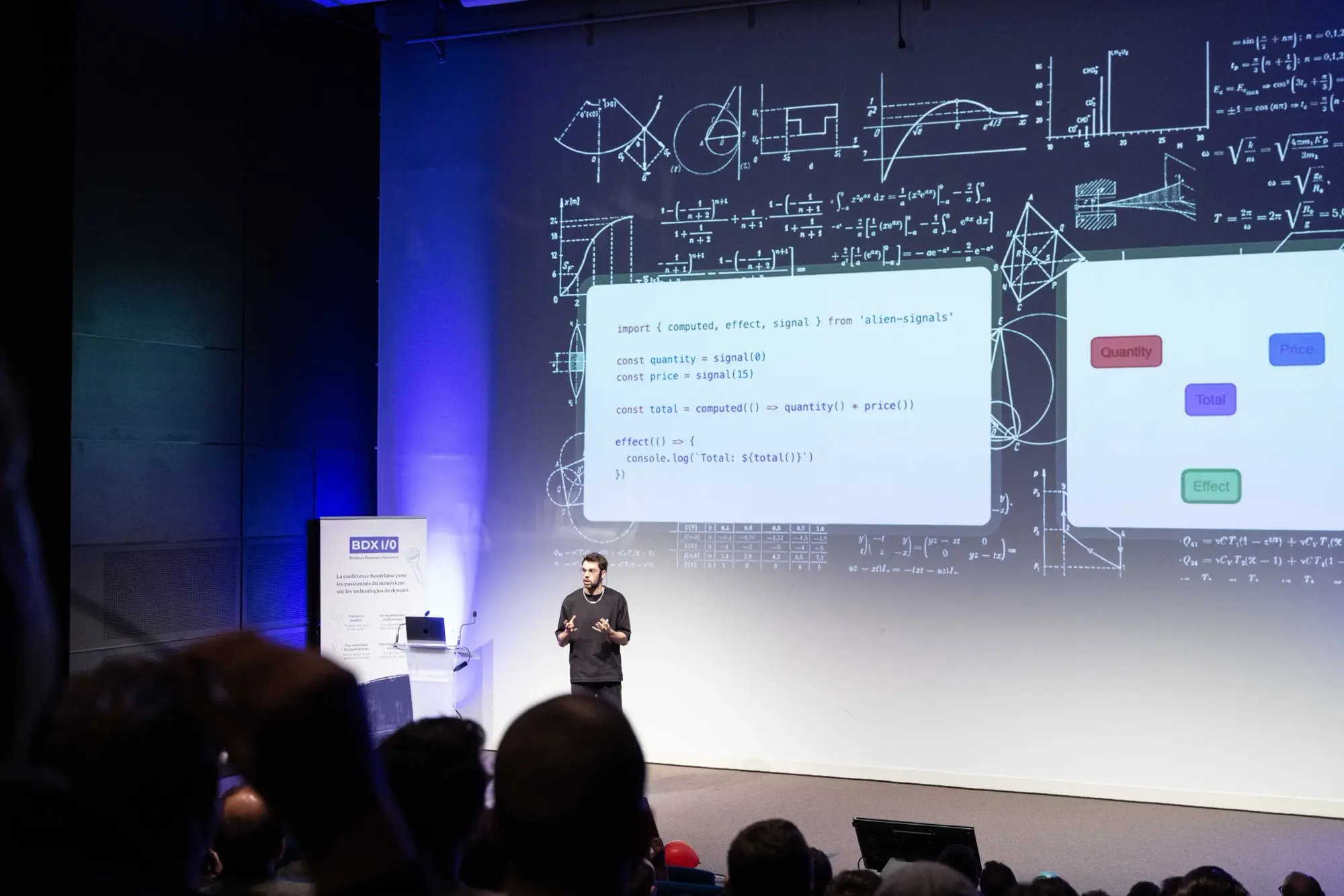 Estéban engaging with the audience during a talk.